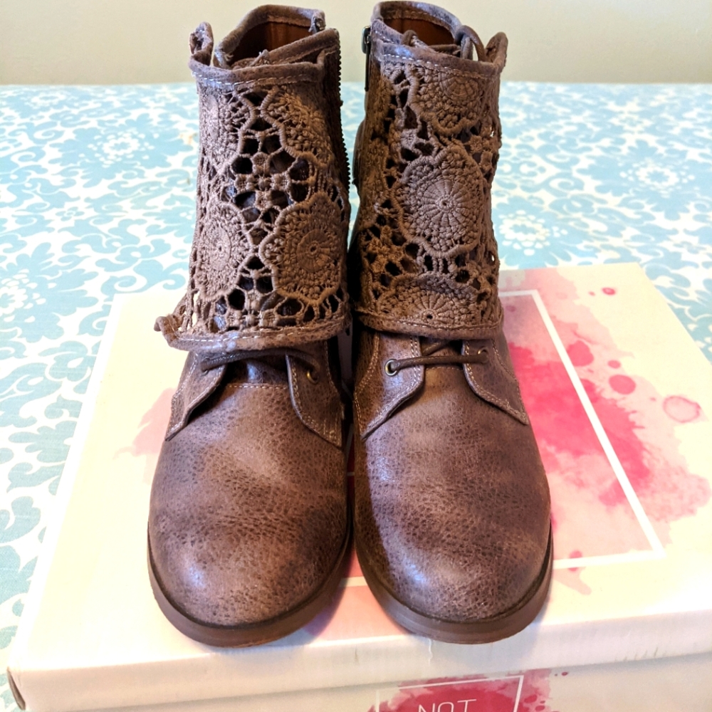 Combat lace boots.